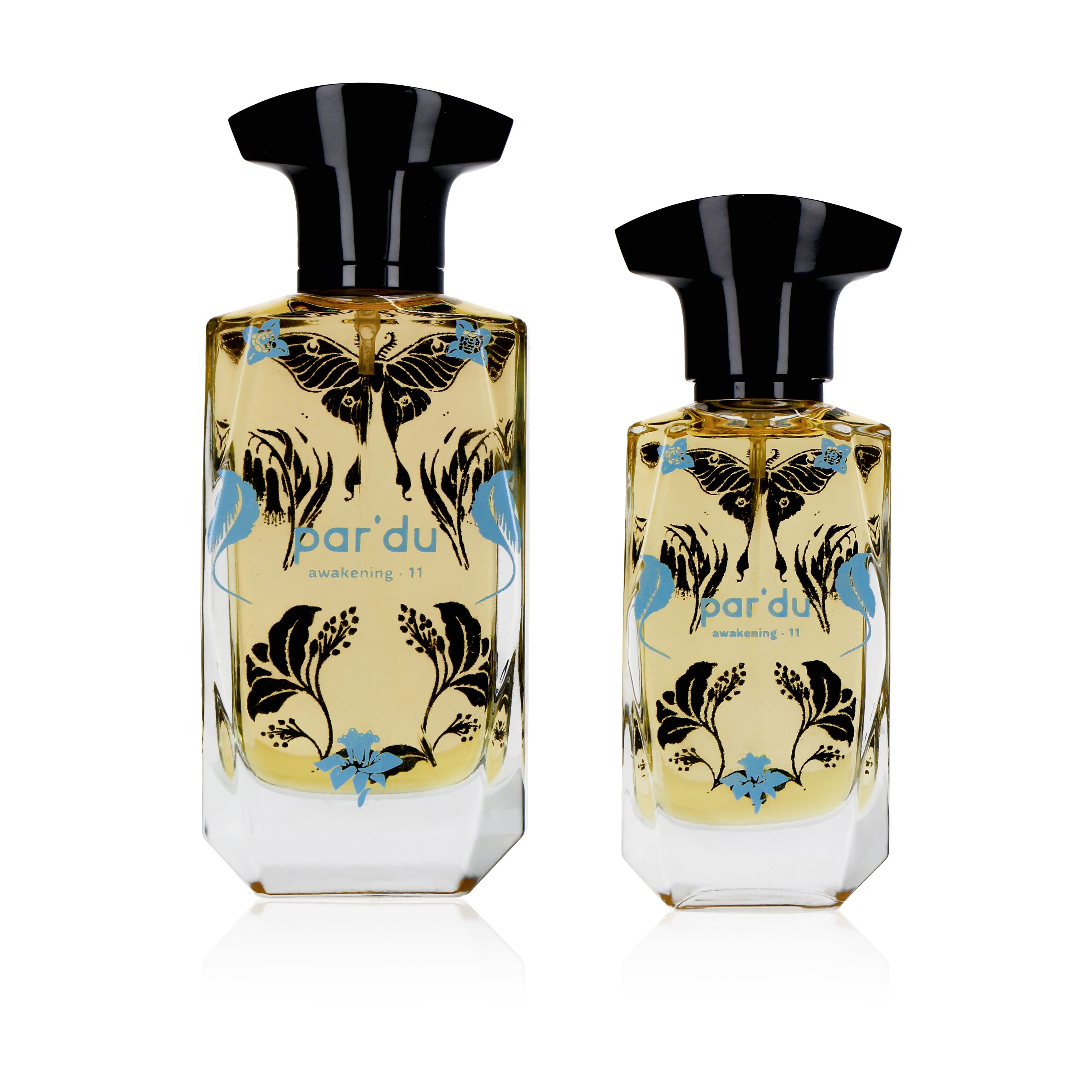 Two parfum bottles with butterfly design labels on a white background